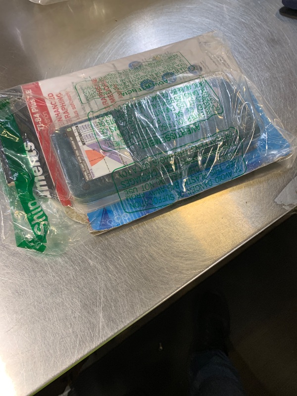 Photo 1 of Texas Instruments TI-84 Plus CE Color Graphing Calculator, Teal (Metallic)