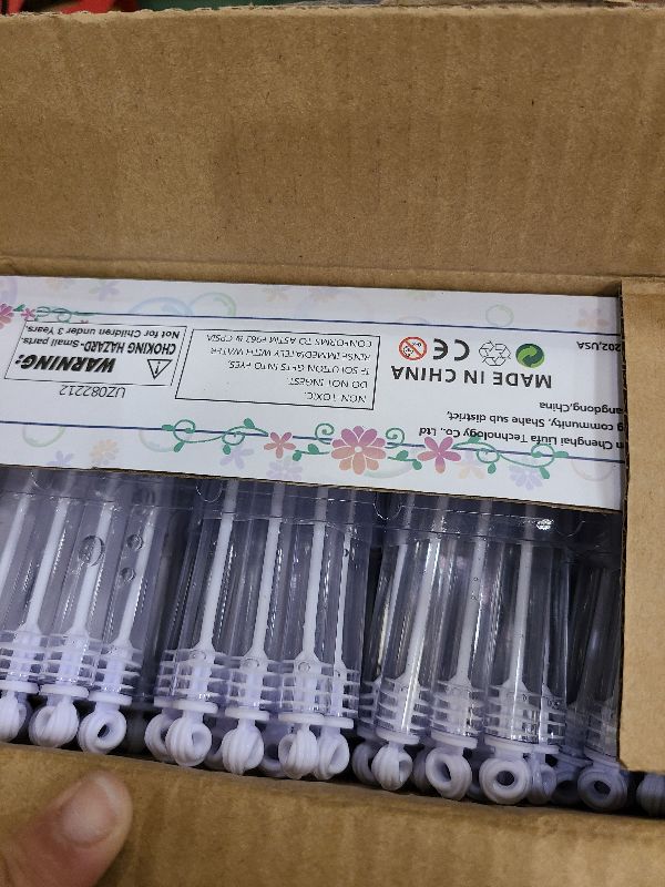 Photo 1 of 200 Pack Mini Bubble Wands, White Bubble Stick Toy Bulk for Wedding Supplies, Anniversaries, Valentine's Day Gift, Celebrations, Wedding Send Off, Party Favor for Couple, Guests, Kid, Boy and Girl