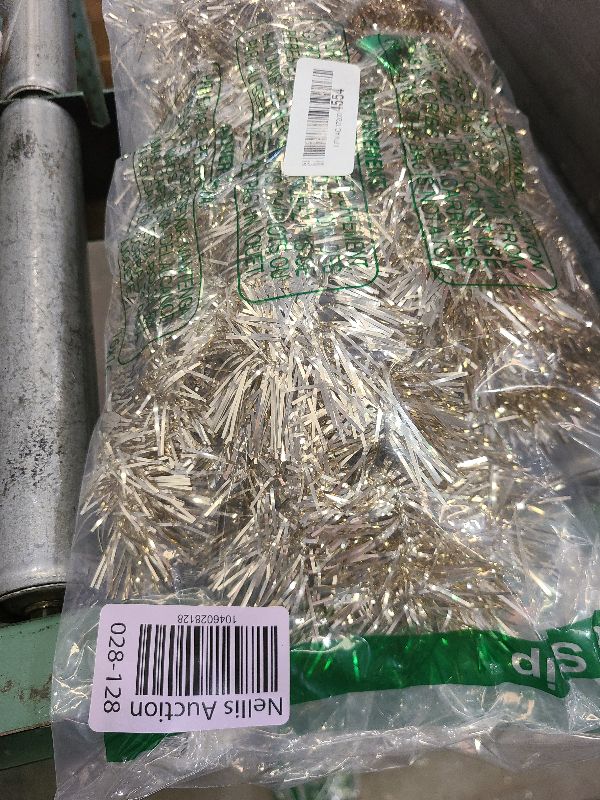 Photo 1 of 50 Feet Christmas Foil Fringe Garland Metallic Tassle Banner Wall Hanging Tinsel Streamers Backdrop for Parade Floats, Birthday, Halloween Party Decorations (2" x 50', Champagne Gold)