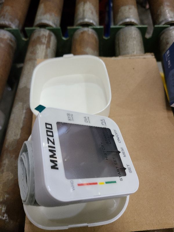 Photo 1 of MMIZOO Wrist Blood Pressure Monitor Large LCD Display BP Machine Adjustable Cuff 5.31-7.68 inch Automatic 99x2 Sets Memory with Carrying Case for Home Use (W1681)