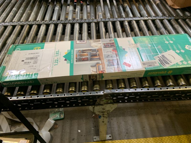 Photo 1 of ClosetMaid ShelfTrack Wire Closet Organizer System, Adjustable from 4 to 6 Ft., With Shelves, Clothes Rods, Hardware, Durable Steel, White