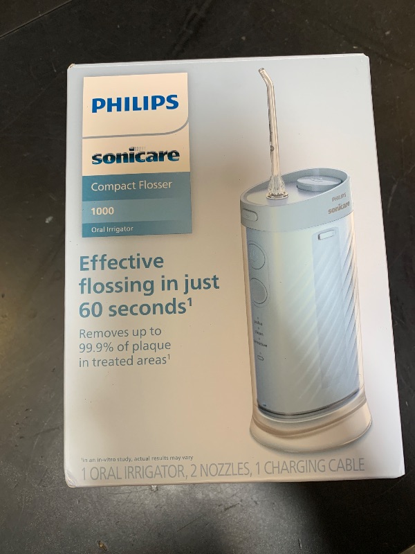 Photo 1 of Philips Sonicare Compact Flosser 1000, Portable Water Flosser with 3 Flossing Modes, IPX7 Waterproof Oral Irrigator, Travel Friendly, Blue, Model HX3333/24