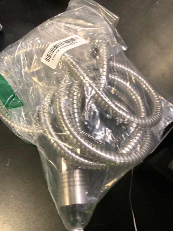 Photo 1 of Waterpik ShowerClean Pro Hand Held Shower Head High Pressure Rinser With Built-in Power Jet -Wash, Shower -Cleaner In Brushed Nickel, QCM-769ME