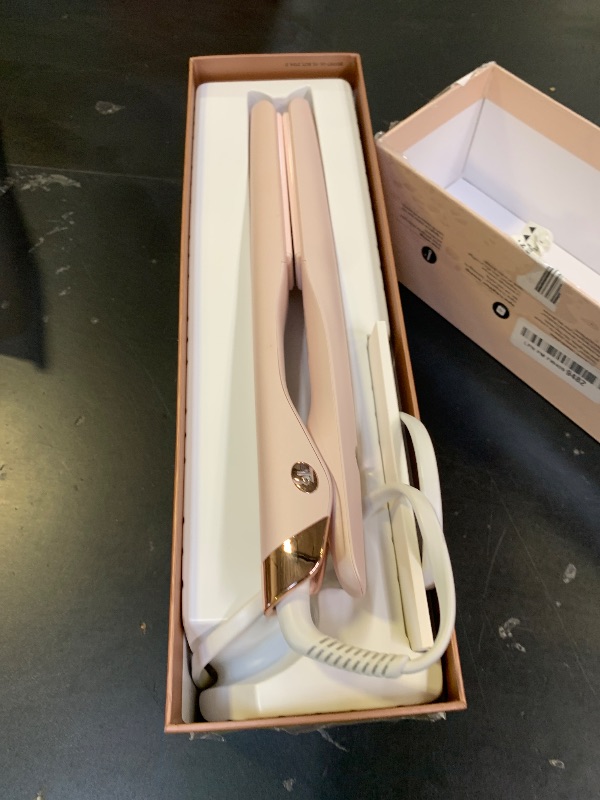 Photo 1 of T3 SinglePass Smooth X Professional Flat Iron with Extra-Long Ceramic Plates for Faster Styling, 9 Heat Settings for All Hair Types, For Straightening, Curling, and Waving
