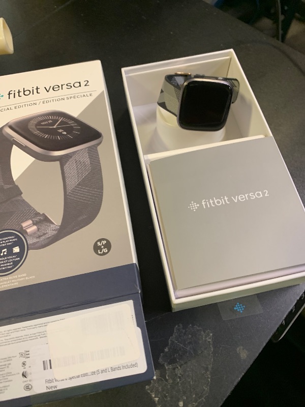 Photo 1 of Fitbit Versa 2 Special Edition Health and Fitness Smartwatch with Heart Rate, Music, Alexa Built-In, Sleep and Swim Tracking, Smoke Woven/Mist Grey, One Size (S and L Bands Included)