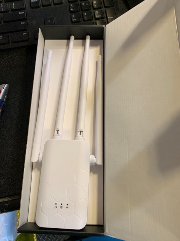 Photo 1 of WiFi Extender Internet Booster, Long Range Repeater Wireless Routers Amplifier, Mesh Wi-Fi 80% Faster | Broader Than Ever, Support More Network Devices at Home, 1 Tap Setup