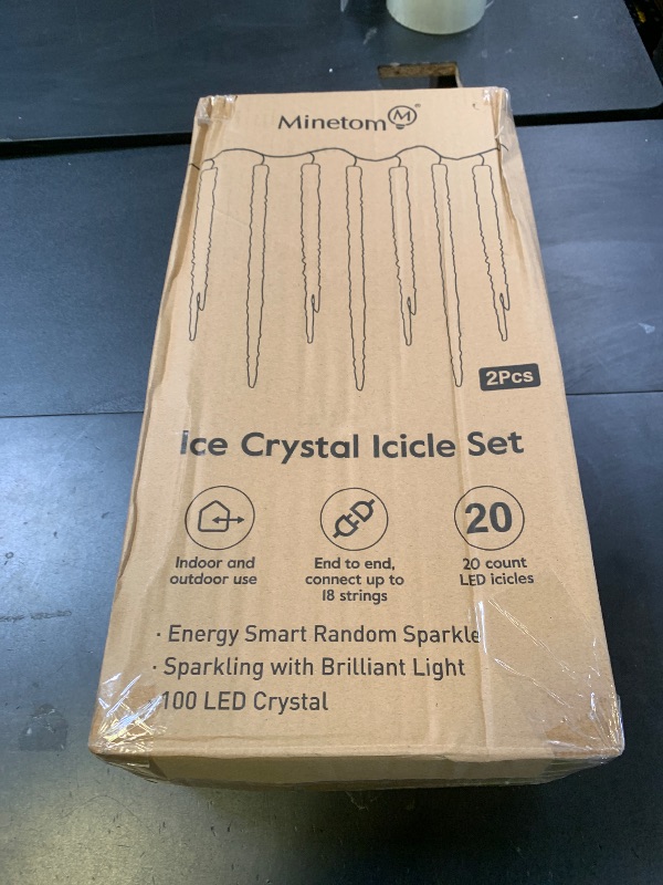 Photo 1 of Minetom Icicle Lights Outdoor with Clips, 2 Pack Total 40ft 200 LED 40 Tubes Twinkling Ice Shape String Lights, Connectable Hanging Christmas Lights Plug in for Eave Holiday Outdoor, Warm White