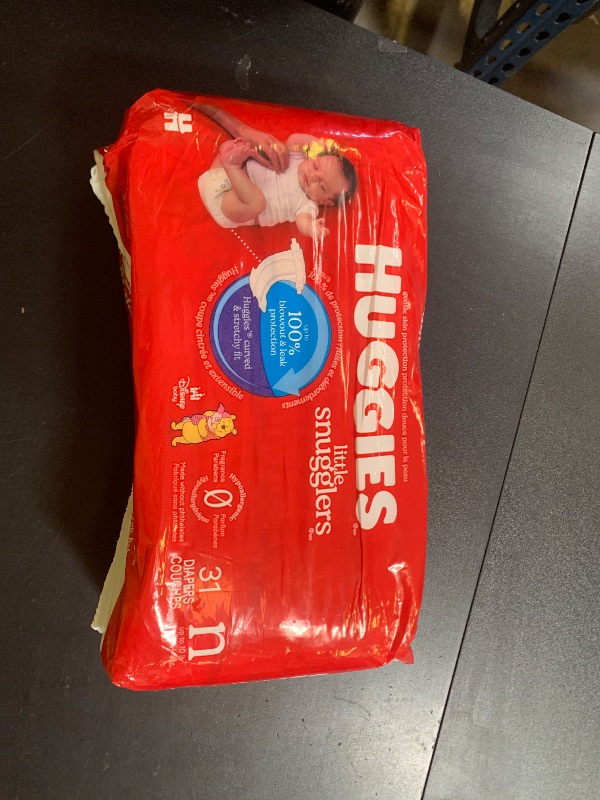 Photo 1 of Huggies Size Newborn Diapers, Little Snugglers Baby Diapers, Size Newborn (up to 10 lbs), 31 Count, Packaging May Vary