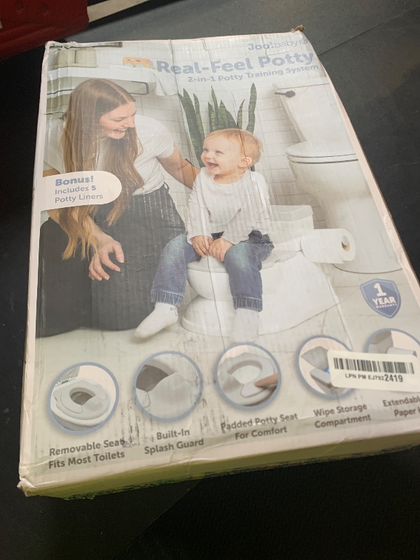 Photo 1 of Real Feel 2-in-1 Potty with Wipes Storage, Flushing Sounds & Disposable Liners - Realistic Toilet - Easy to Clean & Assemble - Jool Baby (Gray)