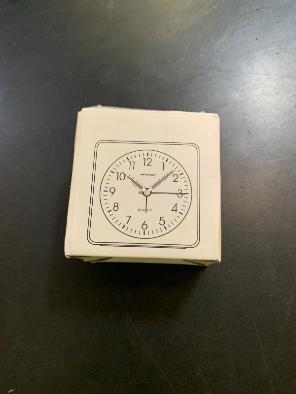 Photo 1 of Peakeep Ultra Small, Battery Travel Alarm Clock with Snooze and Light, Silent with No Ticking Analog Quartz (Aquamarine)