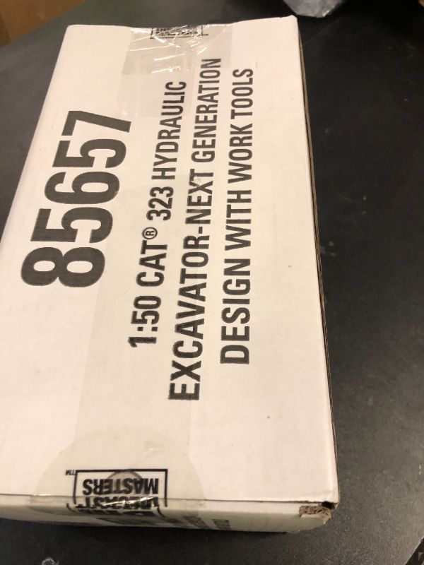 Photo 1 of Diecast Masters Cat Caterpillar 323 Hydraulic Excavator Next Generation Design w/Operator & 4 Work Tools High Line Series 1/50 Diecast Model 85657