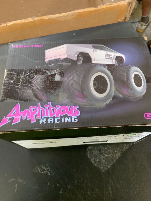 Photo 1 of CFDHYLHH 1:16 Scale Dual-Battery Waterproof Cybertruck RC Truck, 4WD All-Terrain Amphibious Monster Truck with LED Lights, 2.4GHz Quick Charge, 6+ Years STEM Gift