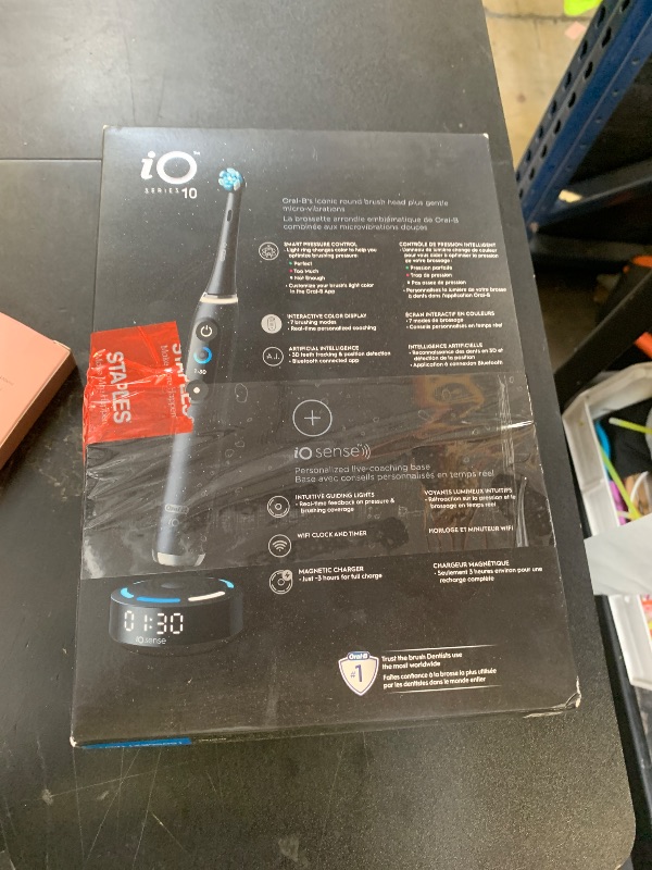 Photo 1 of Oral-B iO Series 10 Rechargeable Electric Toothbrush with Visible Pressure Sensor to Protect Gums, 2 Min Timer, 7 Cleaning Settings, 4 Replacement Toothbrush Heads, and Charging Travel Case, Black