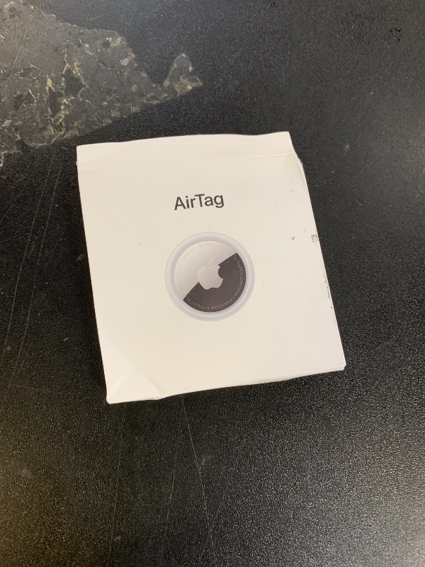 Photo 1 of Apple AirTag. Keep Track of and find Your Keys, Wallet, Luggage, Backpack, and More. Simple one-tap Set up with iPhone or iPad