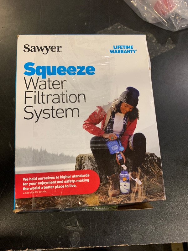 Photo 1 of Sawyer Products SP129 Squeeze Water Filtration System w/ Two 32-Oz Squeeze Pouches, Straw, and Hydration Pack Adapter