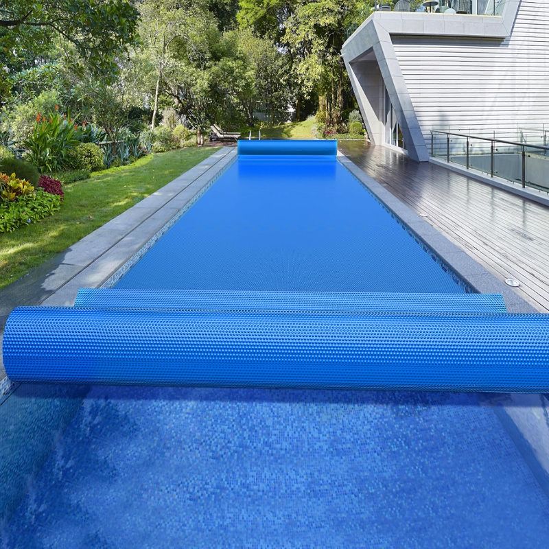 Photo 1 of BigXwell Solar Pool Cover, Blue 16-mil 16 x 32 Foot Rectangle for In-Ground Pools, 1600 Series Heavy-Duty Insulating Pool Heater Covers.