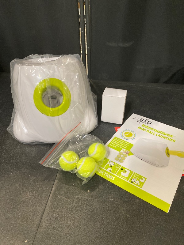 Photo 1 of AFP Automatic Ball Launcher for Dogs Interactive Puppy Pet Ball Indoor Thrower Fetch Machine for Small and Medium Size Dogs, 3 Balls Included (2 inch) Mini