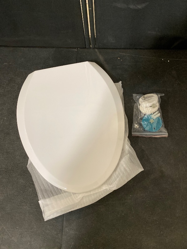 Photo 1 of Hibbent Premium Elongated Toilet Seat with Cover(Oval) Quiet Close, One-Click to Quick Release, Easy Installation Never Loosen Hinge, Slow Close Toilet Seat and Cover, Easy Cleaning-White Color