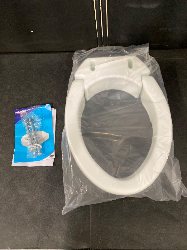 Photo 1 of Carex Elongated Hinged Toilet Seat Riser, Adds 3.5 Inches of Height to Toilet, 300 Pound Weight Capacity, Raised Toilet Seat