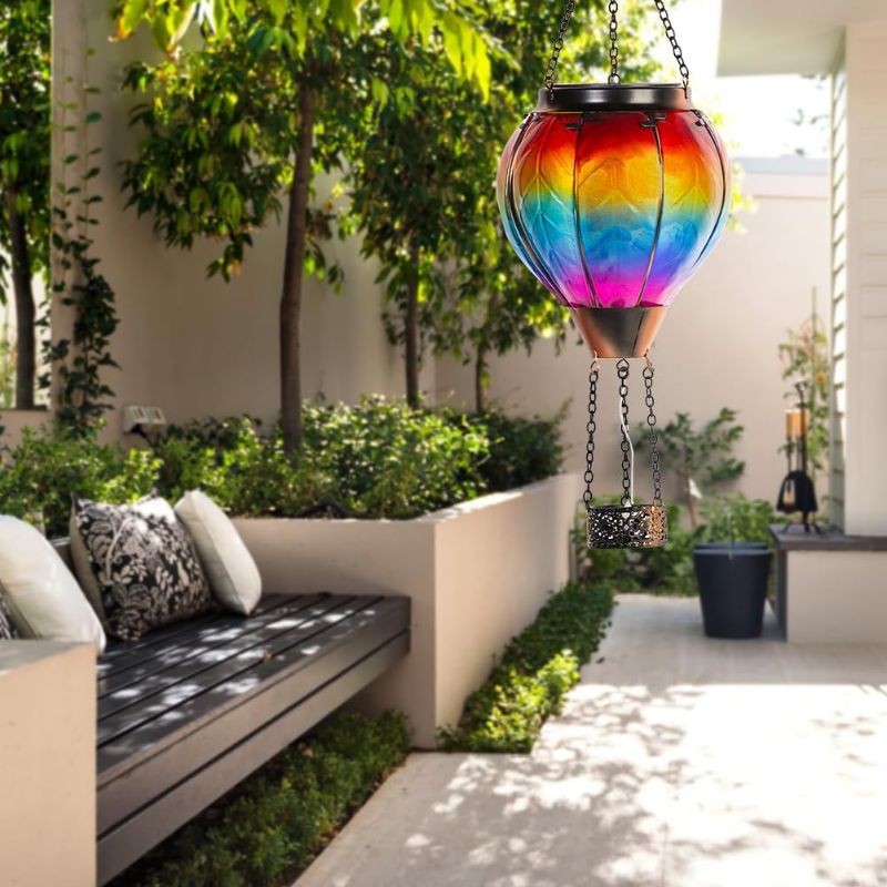 Photo 1 of Starsoul Hot Air Balloon Solar Lantern with Candle Holder Solar Hot Air Balloon Flickering Flame Hanging Garden Light Waterproof Glass Hot Air Balloon Solar Lamp Decorative for Lawn Porch Tree Yard