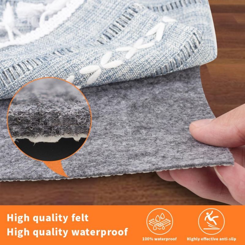 Photo 1 of Non-Slip Rug Pads 9 x 12 ft, 100% Waterproof Extra Large Area Rugs Non Skid Rug Pad for All Floors and Finishes Durable Hardwood Floor Protective Felt Keeps Rugs in Place, Safe and Secure