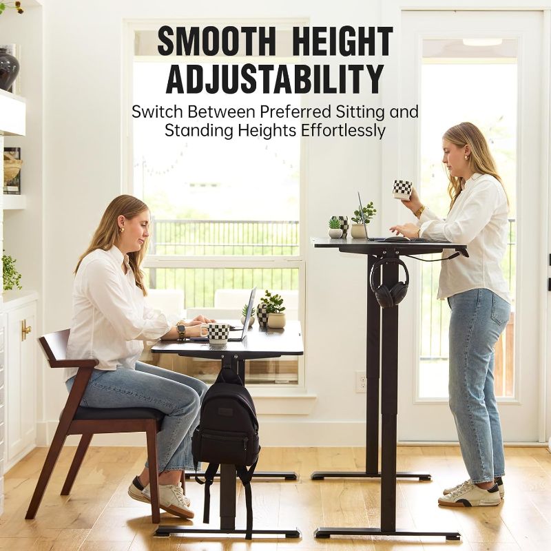 Photo 1 of Veken 55 Inch, Height Adjustable Sit Stand Up, Wood Desktop, Work Home Office Computer PC Table, Tall Standup Workstation, Gaming Writing Study Bedroom Rising Desks, Black