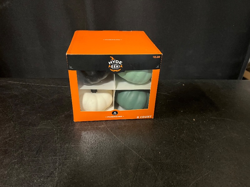 Photo 1 of Hyde and EEK deccorative  pumkins, 8 count