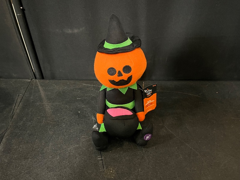 Photo 1 of hyde and eek plush stirring witch