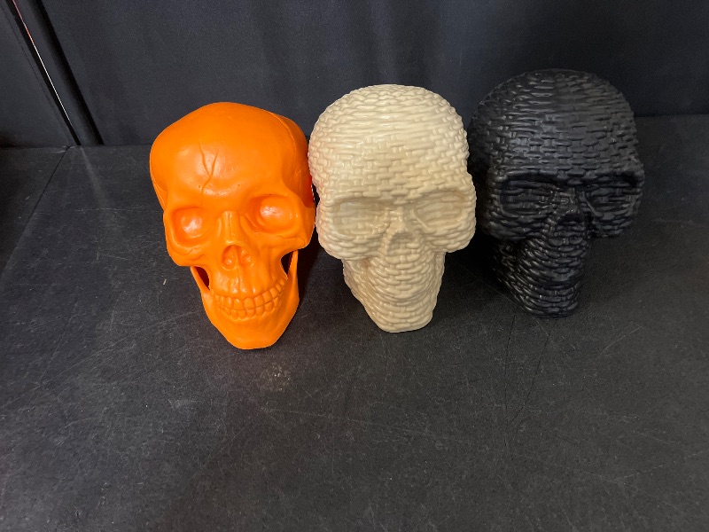 Photo 1 of Hyde and Eek decorative indoor skulls,black, tan and orange(movable jaw)