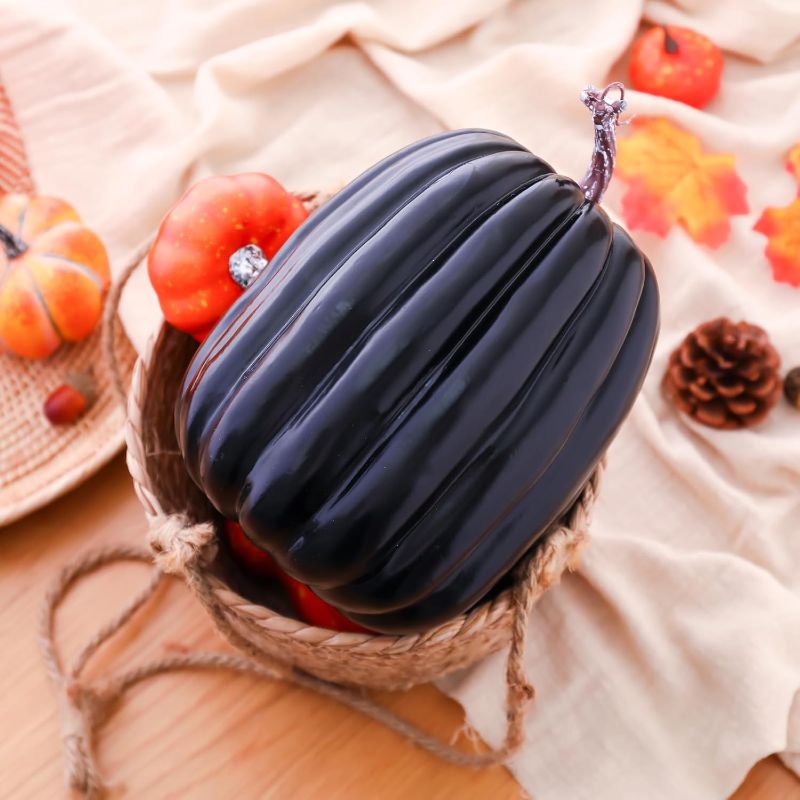 Photo 1 of Hyde and EEK 8 Inch Large Artificial Pumpkins DIY White Decorative Foam Pumpkins Cute Fake Pumpkins for Halloween Autumn Harvest Home Decorations (Black, 8 in)
