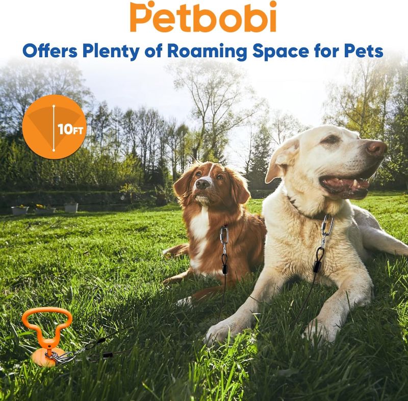 Photo 1 of Petbobi Dog Tie-Out Cable and Stake - Heavy Duty Anti Rust Spiral Stakes, 10ft Steel Wire Run Cable, No Tangle Leash, 360° Swivel Hooks, Dog Runner for Yard Camping, Medium Large Breeds Up to 300lbs