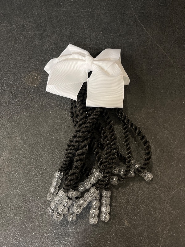 Photo 1 of Kids Braid Ponytail dreadlock Extension with Bowknot Tie Clip in Braids Hair Extensions Wig Thin Dreads Extensions for Children Girls kids Wigs Synthetic Hairpiece Black Color Natural Soft