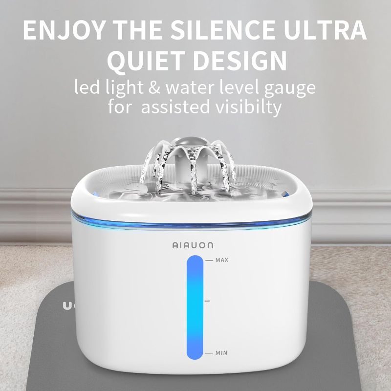 Photo 1 of Cat Water Fountain 84oz/2.5L - Automatic Pet Fountain & Dog Water Dispenser with Replacement Filters & Feeding Mat for Cats, Dogs, Multiple Pets (White)