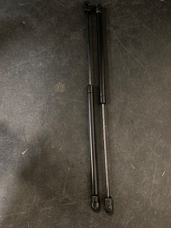 Photo 1 of Front Hood Lift Supports Struts Shocks for 2000-2006 Taurus, 2000-2005 Mercury Sable