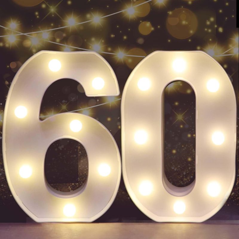 Photo 1 of ooqla Decorative Led Light Up Number Letters, White Plastic Marquee Number Lights Sign for 60th Birthday Party Wedding Decor Battery Operated Number (60)