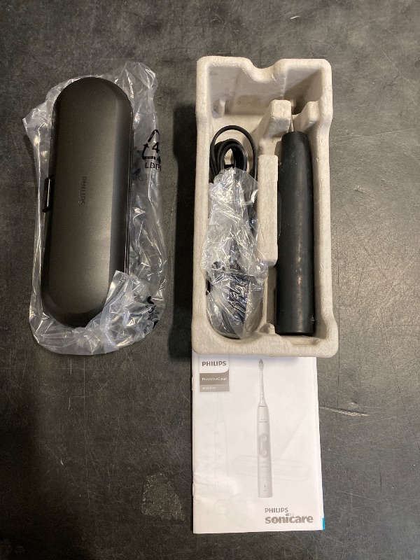 Photo 1 of Philips Sonicare ProtectiveClean 5100 Rechargeable Electric Toothbrush, with Pressure Sensor, 3 Cleaning Modes, SmarTimer and QuadPacer, 14-Day Battery Life, Travel Case, Black, Model HX6850/60