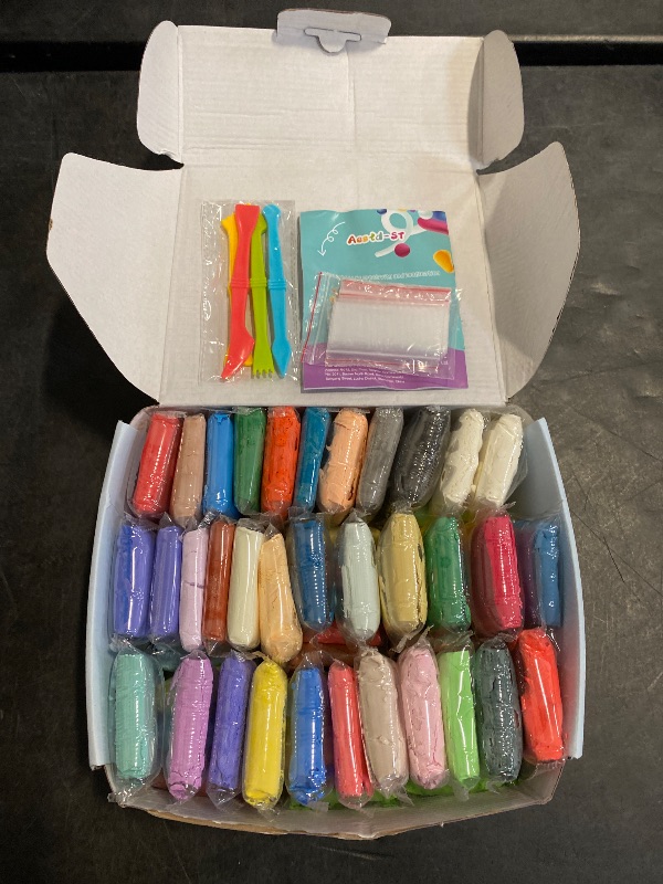 Photo 1 of Air Dry Clay 66 Colors, Modeling Clay for Kids, DIY Model Magic Clay, Molding Clay Kit with Sculpting Tools, Non-Sticky Soft and Super Light, Arts and Crafts Gift for Boys Girls Kids.