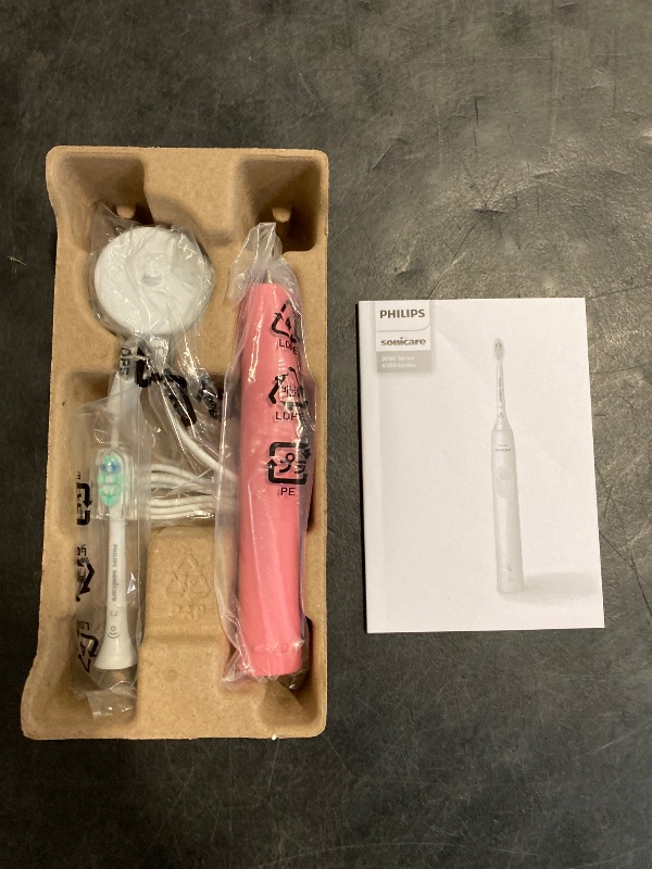 Photo 1 of Philips Sonicare 4100 Rechargeable Electric Toothbrush, with Pressure Sensor, 2 Intensity Settings, SmarTimer and QuadPacer, 14-Day Battery Life, Deep Pink, Model HX3681/26