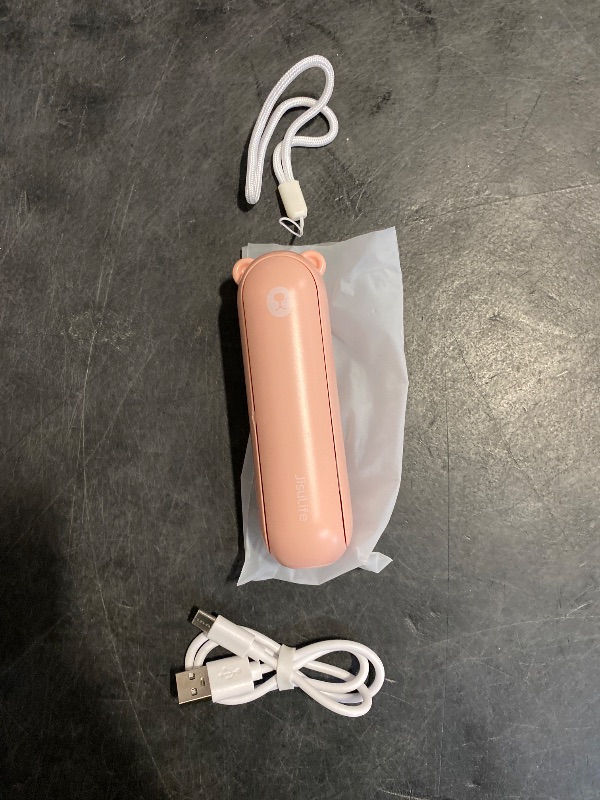 Photo 1 of JISULIFE Handheld Mini Fan, 3 IN 1 USB Rechargeable Portable Fan [12-19 Working Hours] with Power Bank, Flashlight, Pocket Design for Travel/Summer/Concerts/Lash, Gifts for Women (Pink)