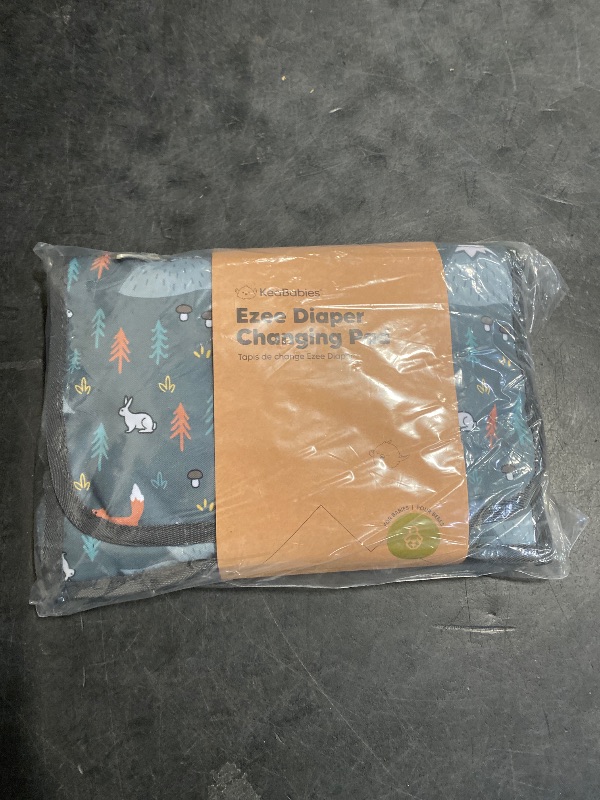 Photo 1 of KeaBabies Portable Diaper Changing Pad - Large Waterproof Baby Changing Mat, Compact Travel Diaper Clutch,Functional Pockets Fit Newborn Essentials,Wipeable & Padded Baby Changer(Woods)