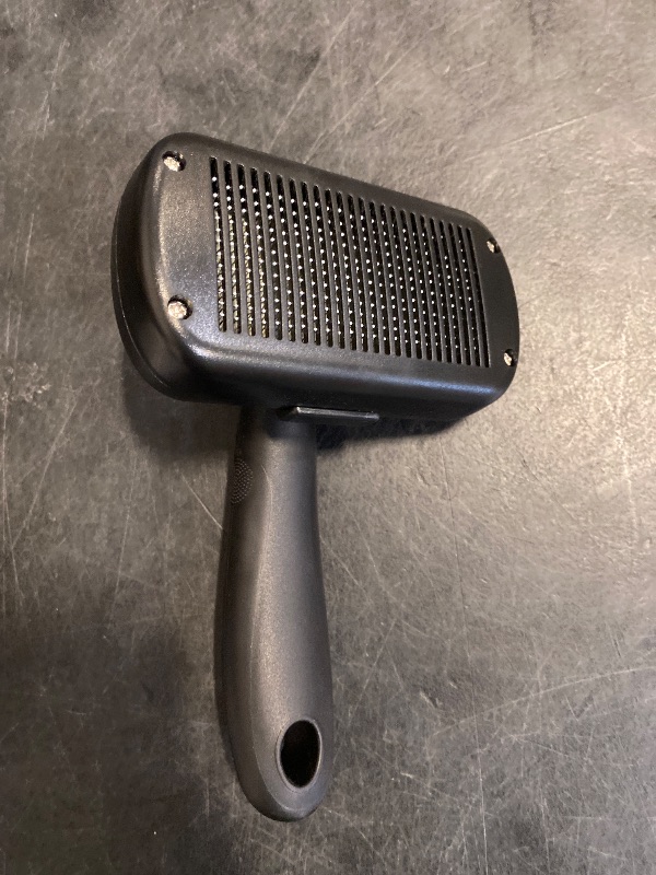 Photo 1 of Dipoo Self Cleaning Shedding Brush - Skin Friendly Grooming Tool for Dogs, Cats, and Puppies, Deshedding and Hair Removal for Long and Short Haired Pets, Black