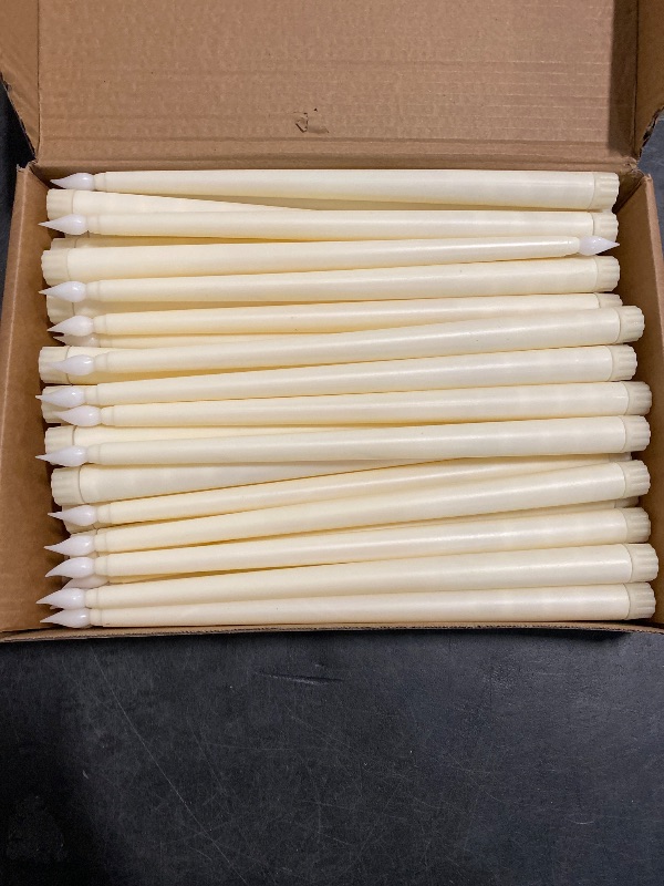 Photo 1 of Baquler Flameless Flicker Taper Candles LED Candles Flickering Warm White Light Ivory LED Candlesticks Window for Christmas Wedding Home Decor(12.8 Inches,50)