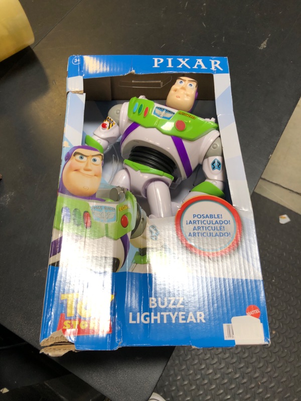 Photo 1 of Mattel Disney Pixar Toy Story Large Action Figure, Posable Buzz Lightyear Collectible in Spacesuit Look, 12-inch Scale