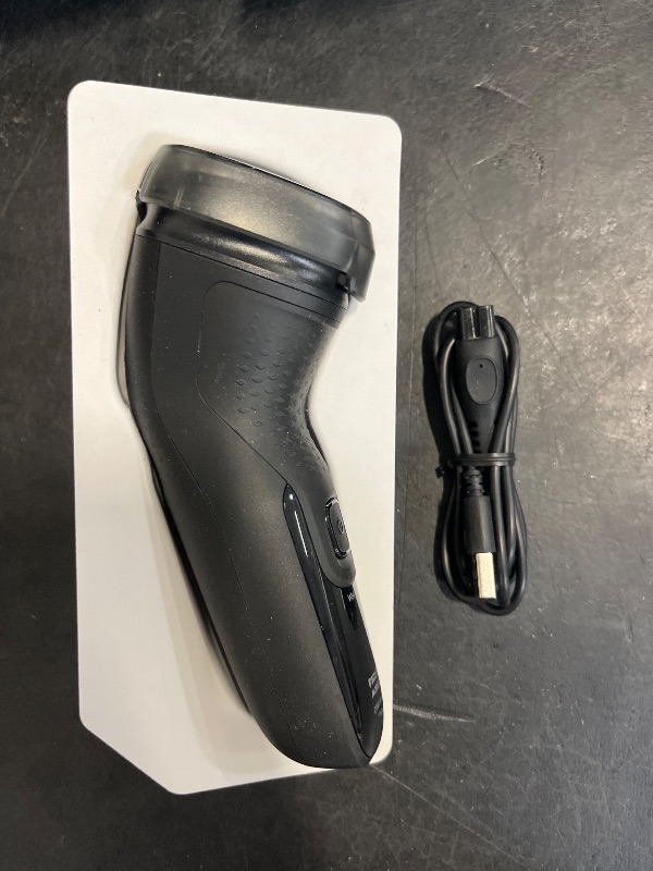 Photo 1 of Philips Norelco Shaver 2400 Series, Wet and Dry Electric Shaver, Pop-up Trimmer, P-Cap, Deep Black, Model X3001/90