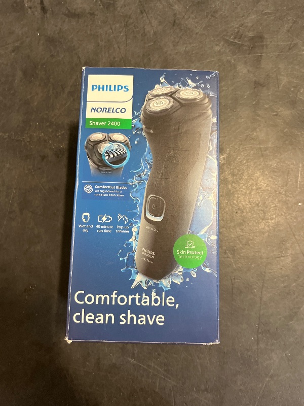 Photo 1 of Philips Norelco Shaver 2400 Series, Wet and Dry Electric Shaver, Pop-up Trimmer, P-Cap, Deep Black, Model X3001/90