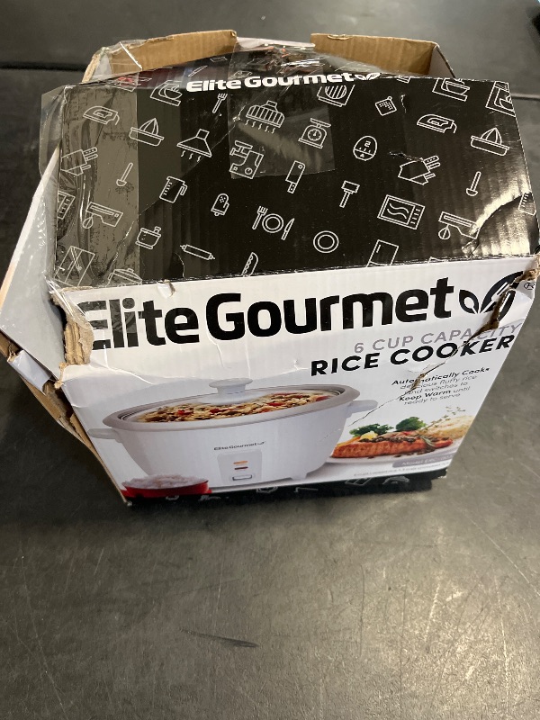 Photo 1 of Elite Gourmet ERC-003 Electric Rice Cooker with Automatic Keep Warm Makes Soups, Stews, Grains, Hot Cereals, White, 6 Cups Cooked (3 Cups Uncooked)