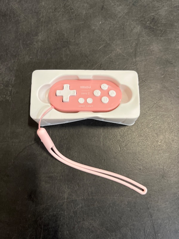 Photo 1 of 8Bitdo Zero 2 Bluetooth Gamepad Keychain Sized Mini Controller for Switch, Windows, Android, macOS & Raspberry Pi(Pink Edition) - Nintendo Switch
