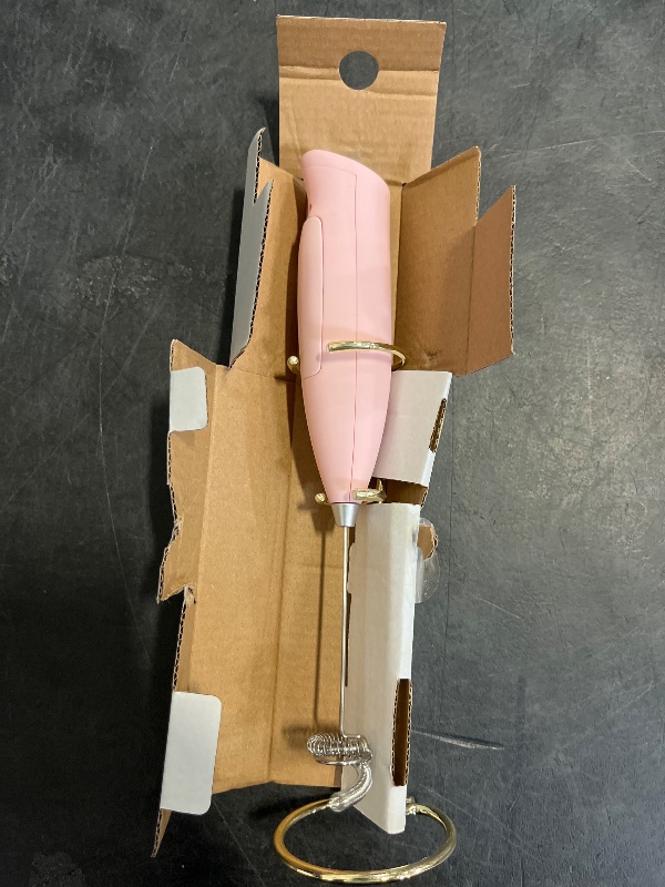Photo 1 of Paris Hilton Electric Handheld Milk Frother with Double Coil Head Whisk and Gold Metal Stand, Battery Powered (2 AA Batteries Required but Not Included), Pink Sparkle Finish