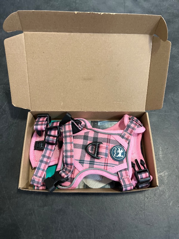 Photo 1 of PoyPet No Pull Dog Harness, [Release at Neck] Reflective Adjustable No Choke Pet Vest with Front & Back 2 Leash Attachments, Soft Control Training Handle for Small Dogs(Checkered Pink,XS)