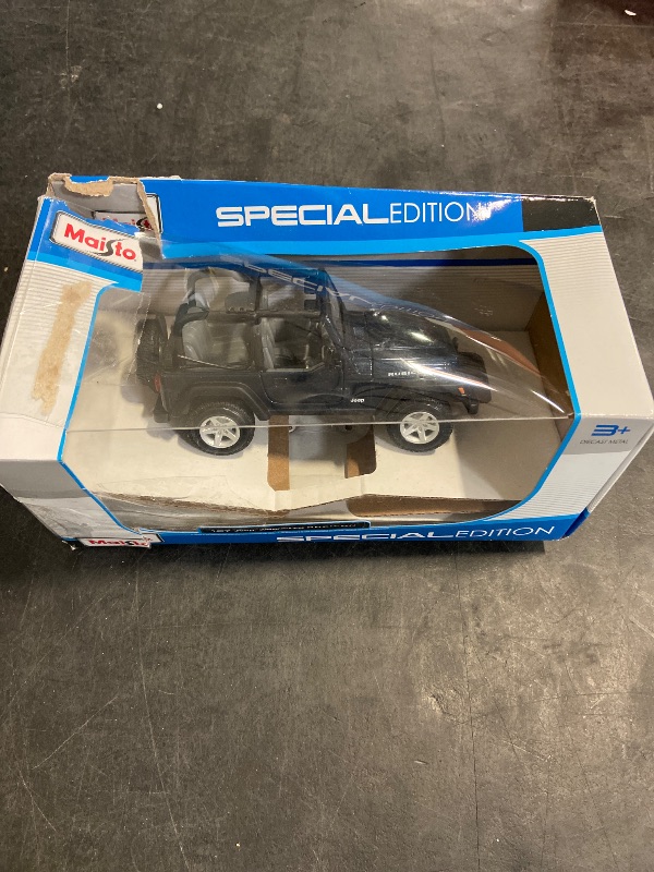 Photo 1 of Maisto 1:27 Scale Jeep Wrangler Rubicon Diecast Vehicle (Colors May Vary)